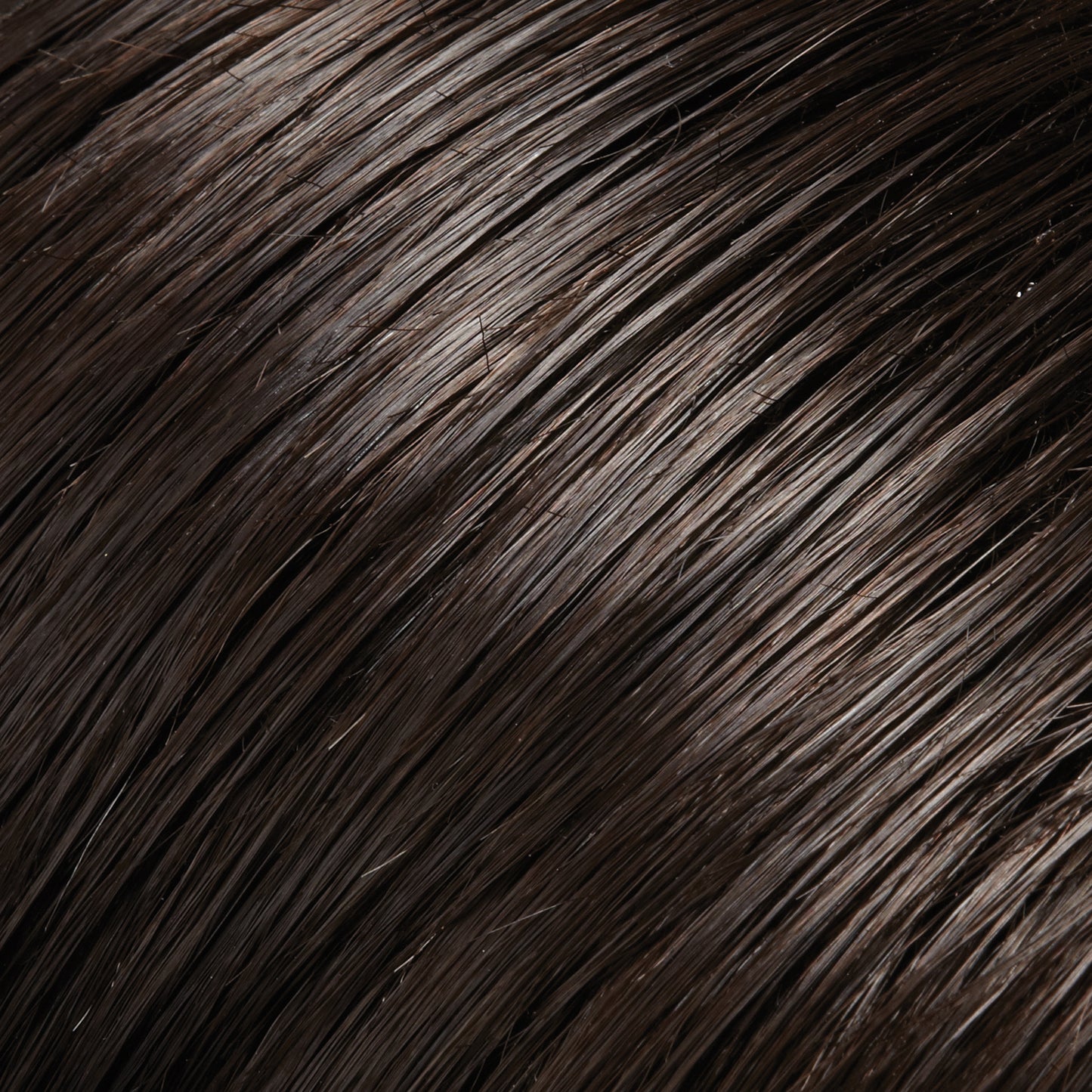 Close-up of dark brown hair texture