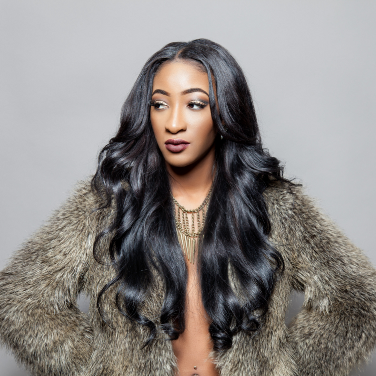 Black Clip-Ins Hair Extensions used to add volume and length to the hair from OGP Boutique