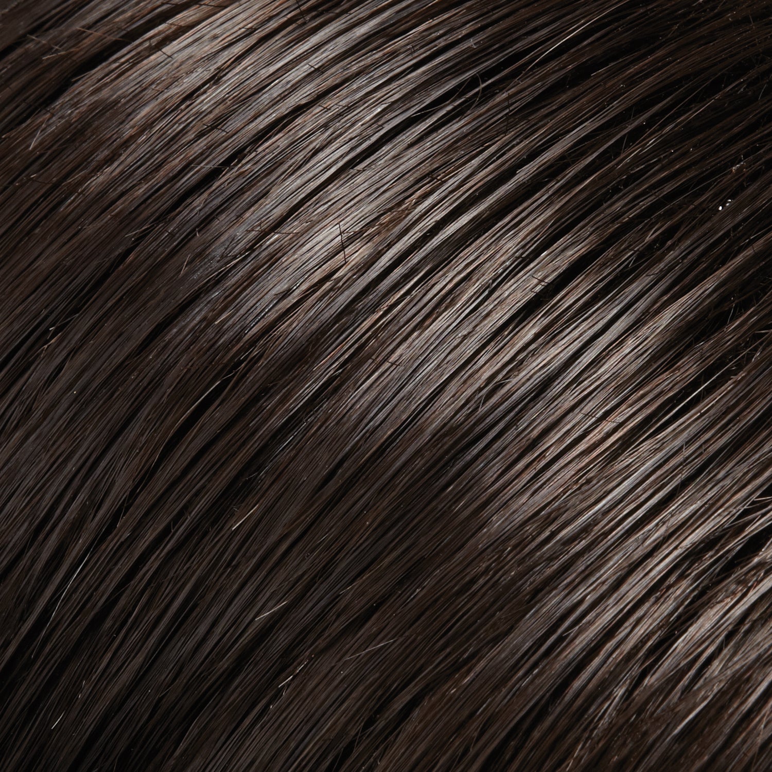 Close-up of dark brown hair texture