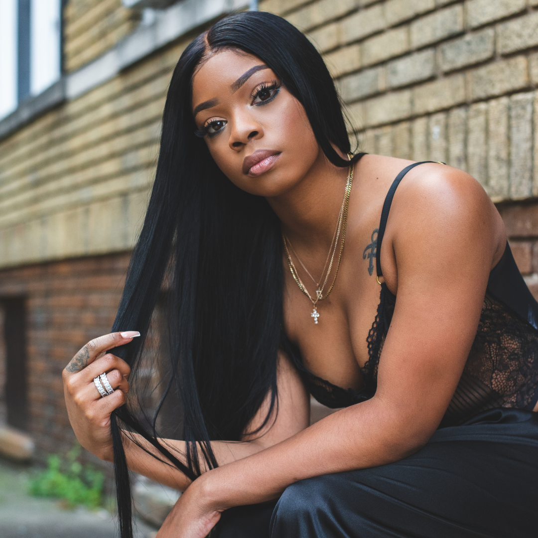 Beautiful lady holding her straight front lace long wig